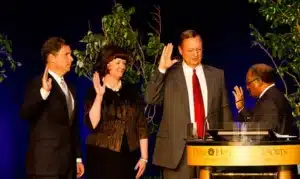 Group of people being sworn in