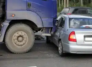 Truck accident vs car accident: a commercial truck T-bones a sedan.